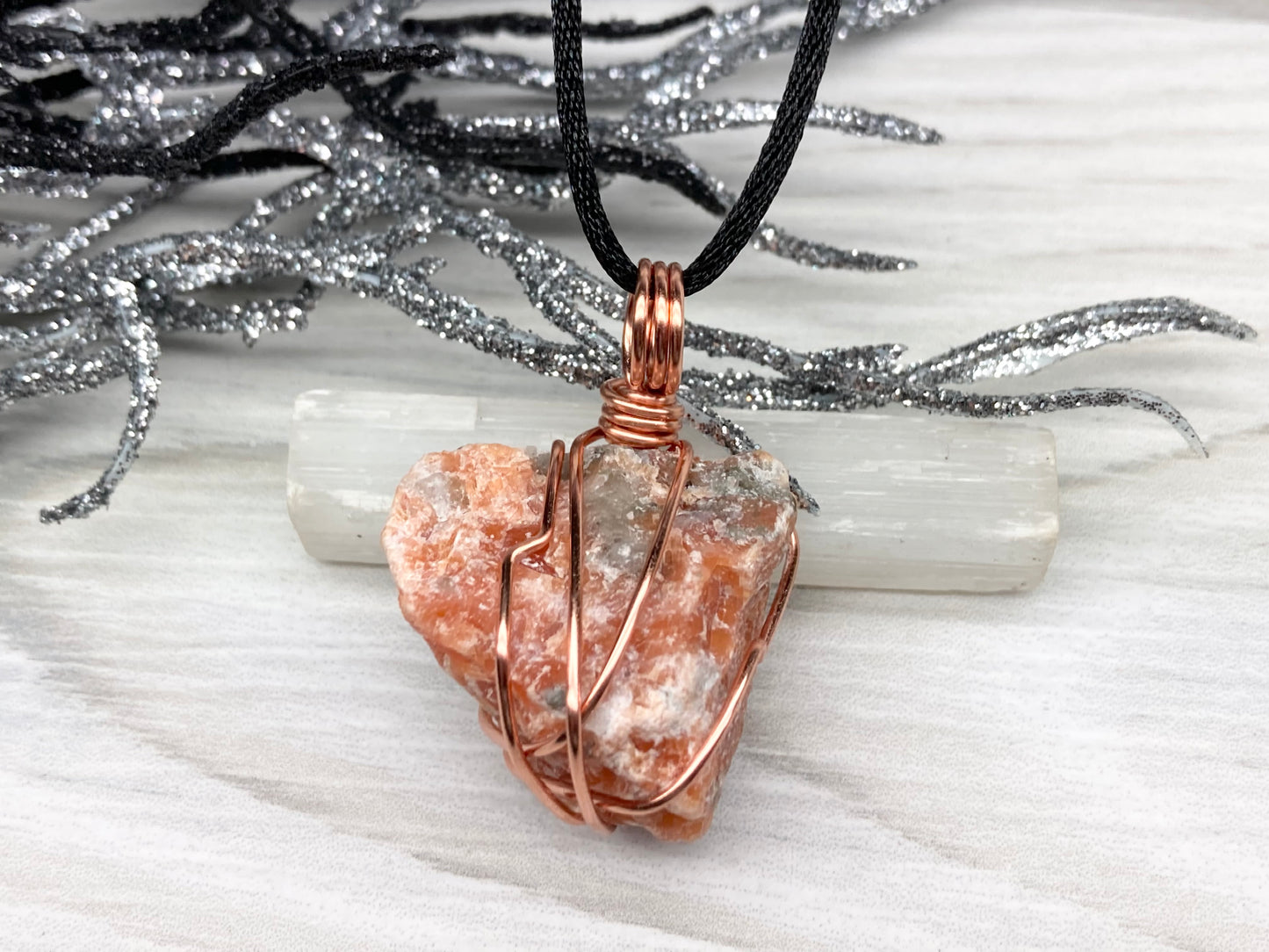 Natural Raw Orange Calcite Crystal Hand Wrapped With Tarnish Resistant Copper Wire. Comes On A Black Chain. Crystal Is Orange With A Bit Of Blue On The Top.Pendant Handcrafted During The Moon In Sagittarius. New Age Style Jewelry.
