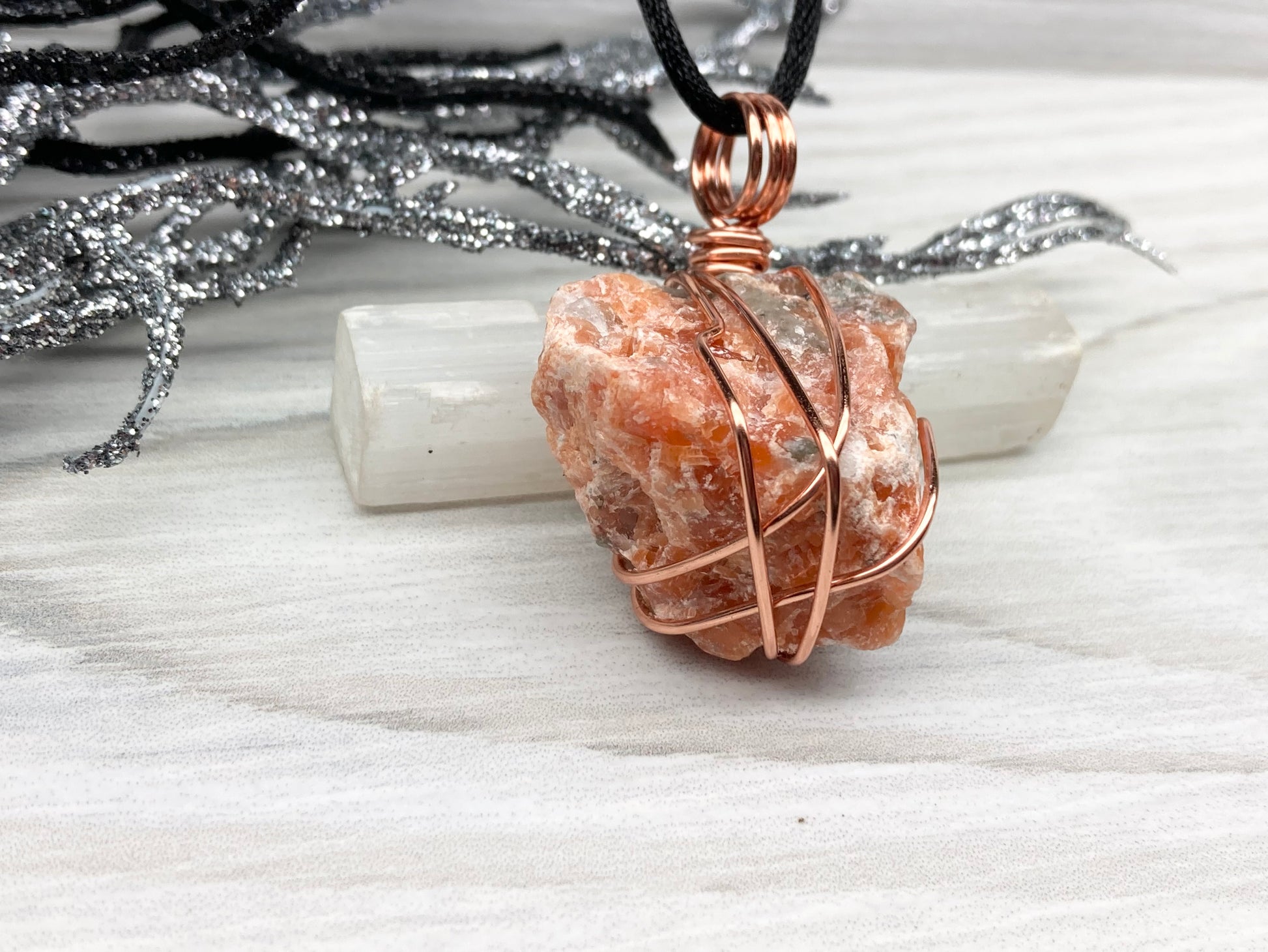 Natural Raw Orange Calcite Crystal Hand Wrapped With Tarnish Resistant Copper Wire. Comes On A Black Chain. Crystal Is Orange With A Bit Of Blue On The Top.Pendant Handcrafted During The Moon In Sagittarius. New Age Style Jewelry.