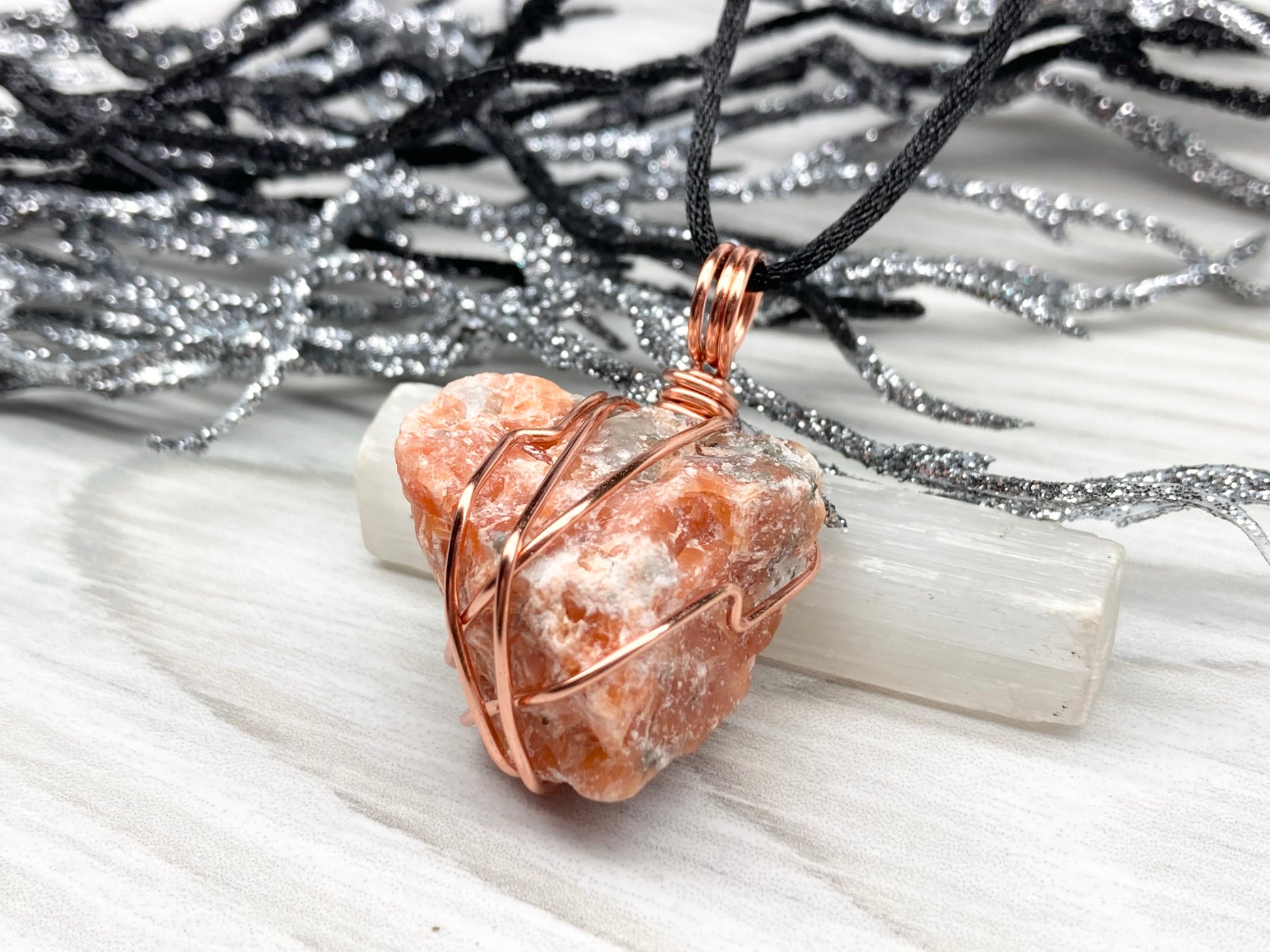 Natural Raw Orange Calcite Crystal Hand Wrapped With Tarnish Resistant Copper Wire. Comes On A Black Chain. Crystal Is Orange With A Bit Of Blue On The Top.Pendant Handcrafted During The Moon In Sagittarius. New Age Style Jewelry.