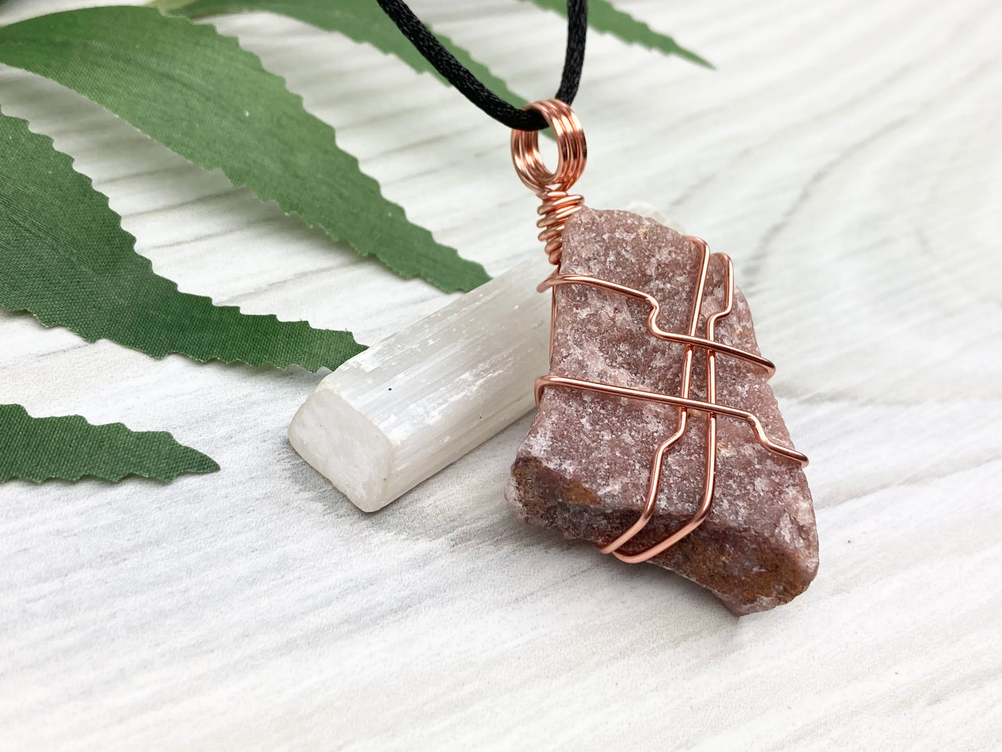 Raw Guava Quartz Necklace. Guava Quartz Crystal Wrapped With Tarnish Resistant Copper Wire. Reddish Brown Stone Pendant. Comes On A Black Chain. Aquarius Zodiac Crystal. Spiritual New Age Jewelry.