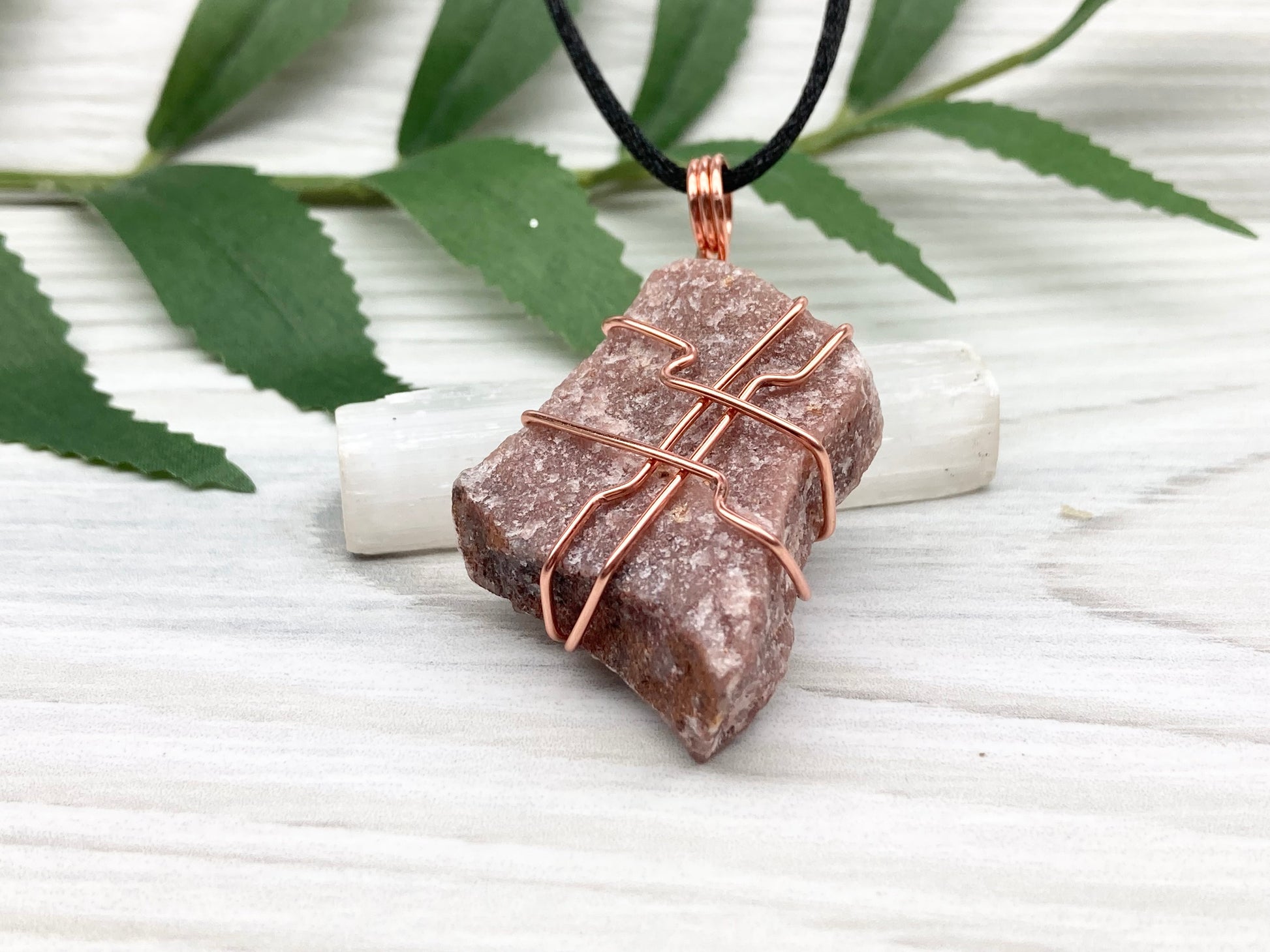 Raw Guava Quartz Necklace. Guava Quartz Crystal Wrapped With Tarnish Resistant Copper Wire. Reddish Brown Stone Pendant. Comes On A Black Chain. Aquarius Zodiac Crystal. Spiritual New Age Jewelry.