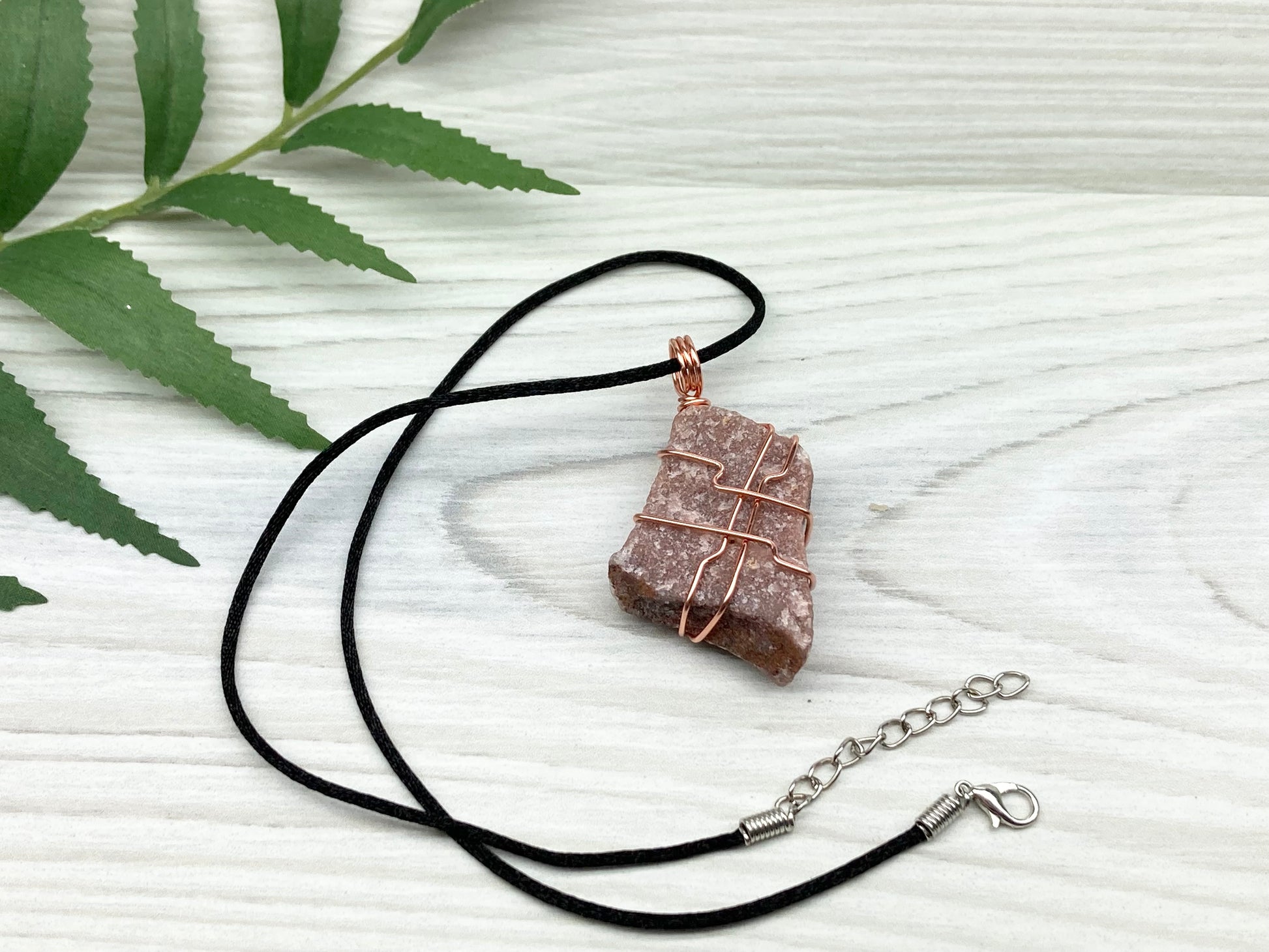 Raw Guava Quartz Necklace. Guava Quartz Crystal Wrapped With Tarnish Resistant Copper Wire. Reddish Brown Stone Pendant. Comes On A Black Chain. Aquarius Zodiac Crystal. Spiritual New Age Jewelry.